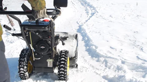 Men shoveling snow machine and shovel Vidéo 36677782