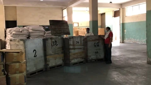 Men shutting a storage container Stock Footage 158438945