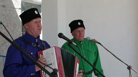  Men sing into a microphone and playing the accordion Stock Footage 63659022