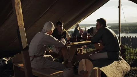 Men sit at the table Stock Footage 82345866