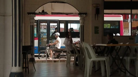 Men Sitting and Talking in a Chinese Kopitiam Shop Stock Footage 48137540