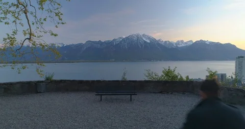 Men sitting on a bench in front of beautiful winter view Stock-Footage 117363033