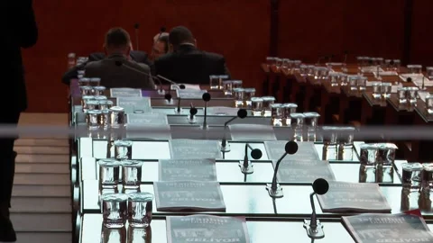Men sitting in the front rows of the city council Video stock 288217083