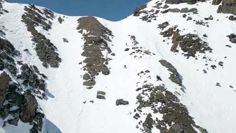 Men Skiing in Mountains Stock Footage 277107729