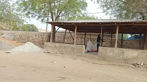 Men Sleeping In Incomplete Mosque Building Street Scene Kano Nigeria Stock-Footage 330547888