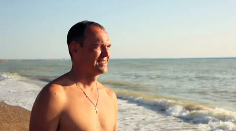 Men smiling at sea Stock Footage 26392676