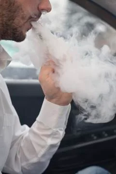 Men smoke. Stock Photos