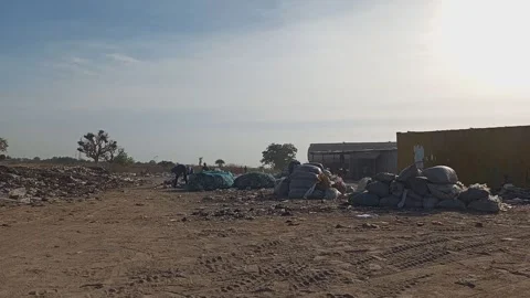 Men Sorting And Packaging Recyclables At Dump Site Naibawa Kano Видео 325964624