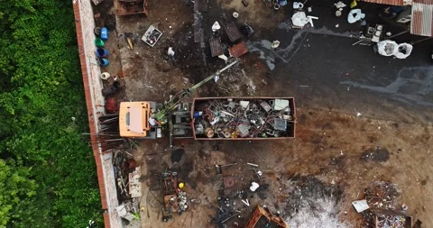 Men Sorting Through Garbage In Hot Tropical Climate Metal Separation Aerial Top Stock Footage 300444639