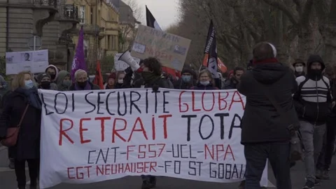 Men speaking on megaphone while doing protest against proposed security Stock Footage 154693705
