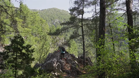 The men stands on the top of the mountain Stock Footage 307607109