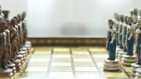 The men start to play game of chess on a greek theme ceramic board Stock Footage 198677552