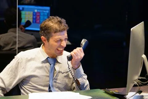Men in stress in front of computer Stock Photos
