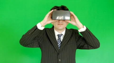 Men in suits using 3D VR glasses Stock Footage 61262995