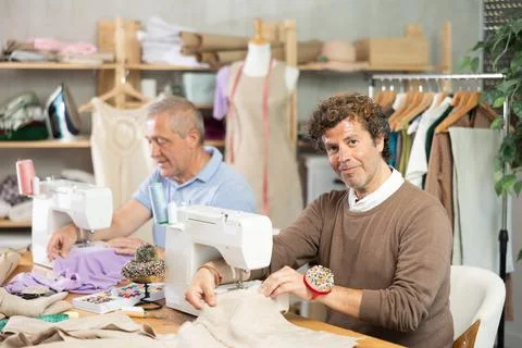 Men tailor at work Stock Photos