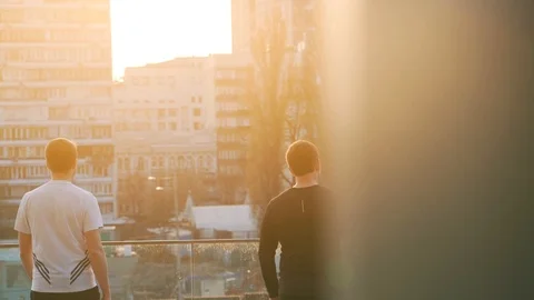 Men talking after jogging in the city Stock Footage 94670983