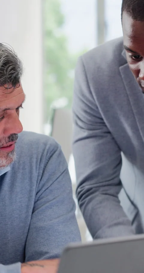 Men, talking and teamwork with laptop in business, online or financial planning Stock Footage 337024261