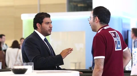 Men talking at business event Stock Footage 56370603