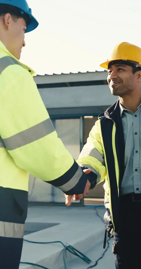 Men, team or handshake on construction site for welcome, building development an Stock Footage 345575981