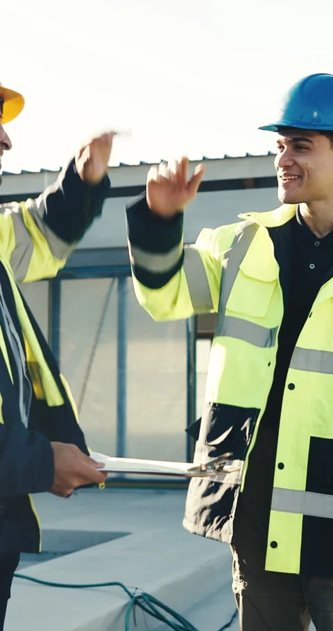 Men, team or high five on construction site for success, building development Stock Footage 345572951