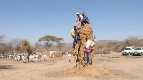 Men on termite mound during the Gada sy... | Stock Video | Pond5