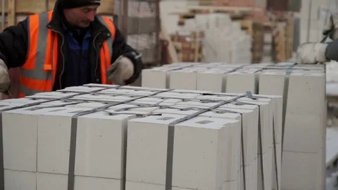 Men tie stone blocks Stock Footage 82139798