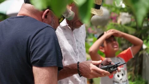 Men tourist using drone with remote controller Stock Footage 174678899