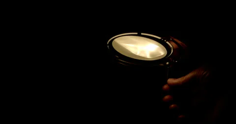 Men turning off lamp / Slow motion Stock Footage 130985015