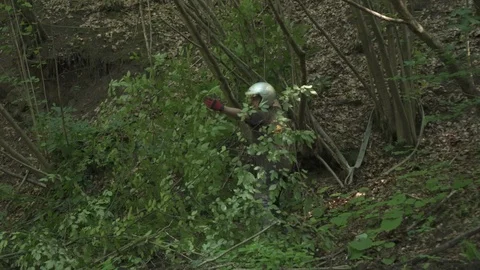 Men tying strings to a car Stock Footage 100861910