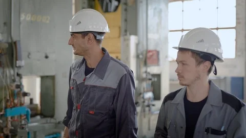 Men in uniform standing in workshop Video stock 95020973