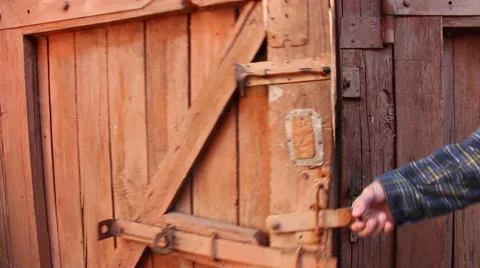 A men unlocks the door Stock Footage 65448300