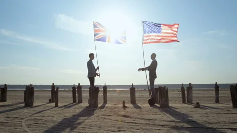 Men with US and UK flags in their hands. Stock Footage 137947384