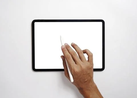 Men use digital tablets on desks with blank screens Stock Photos