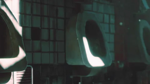 Men use urinal in public restroom during busy hours in urban area Video stock 345007799