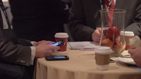 Men using cell phones at a conference Stock Footage 62414522