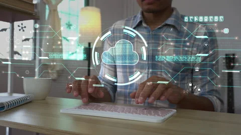 A men using computer for connecting to a cloud computing data hologram. Stock Footage 172027635