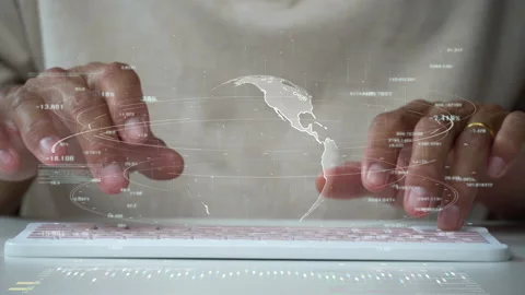 A men using computer for connecting to a cloud computing data hologram. Stock Footage 209429002