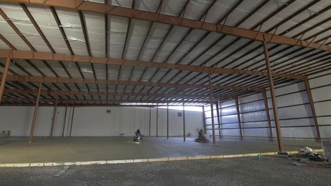 Men Using Machinery on Newly Poured Concrete Stock-Footage 101390462