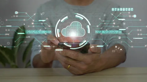 A men using smart phone for connecting to a cloud computing data hologram. 库存影片 172027630