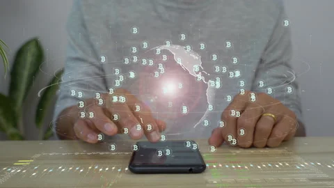 A men using smart phone for connecting to a cloud computing data hologram. Stock Footage 208573670