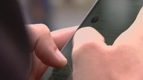 Men using smartphone Stock Footage 80357109