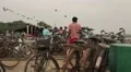 Men walking between the parked bikes in Sri Lanka HD Footage