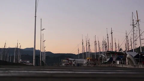 Men walking on Boardwalk - Parati Harbor - Rio de Janeiro Stock Footage 83856205