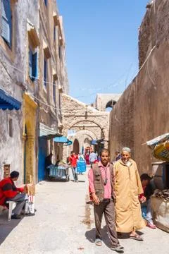 Men walking down a street Stock-Fotos
