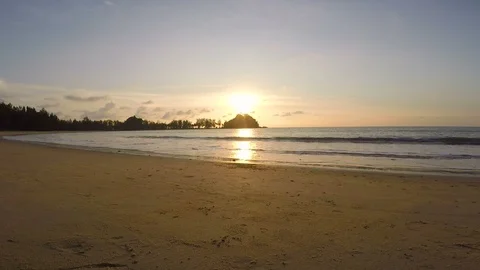 Men walking on evening beach Stock Footage 85696364