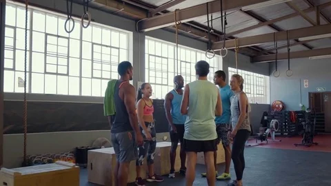 Men walking into gym to exercise Stock Footage 71617977