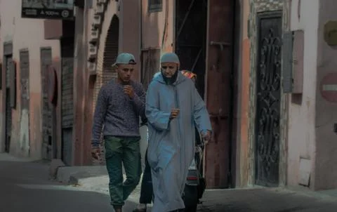 Men Walking in Marrakesh Stock Photos