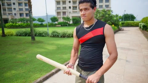 Men Walking With Stick in Hand Burning from Anger Video stock 295468571