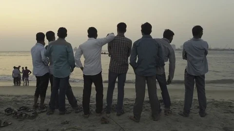 Men watching the sunset Stock Footage 82316219