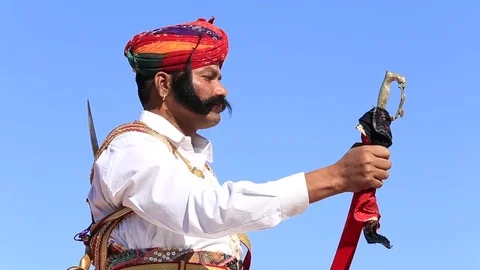 Image of Portrait of artist in traditional rajasthani dress at Bikaner  Camel festival-YF517400-Picxy